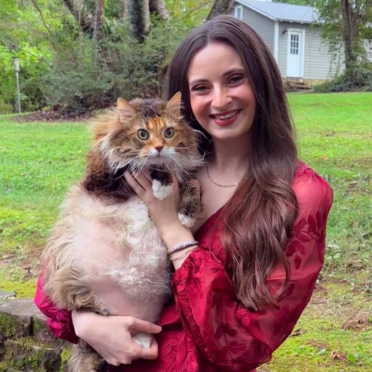 macy willbanks holding a cat